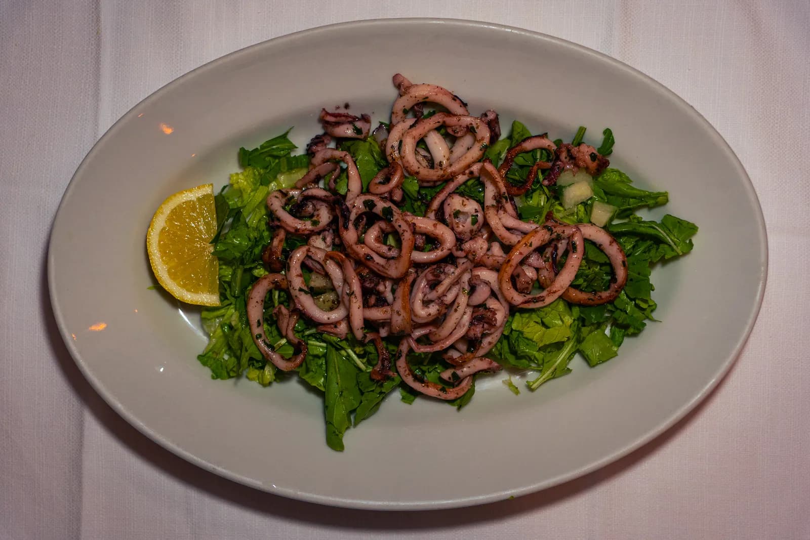 Calamaretti saltati con insalata